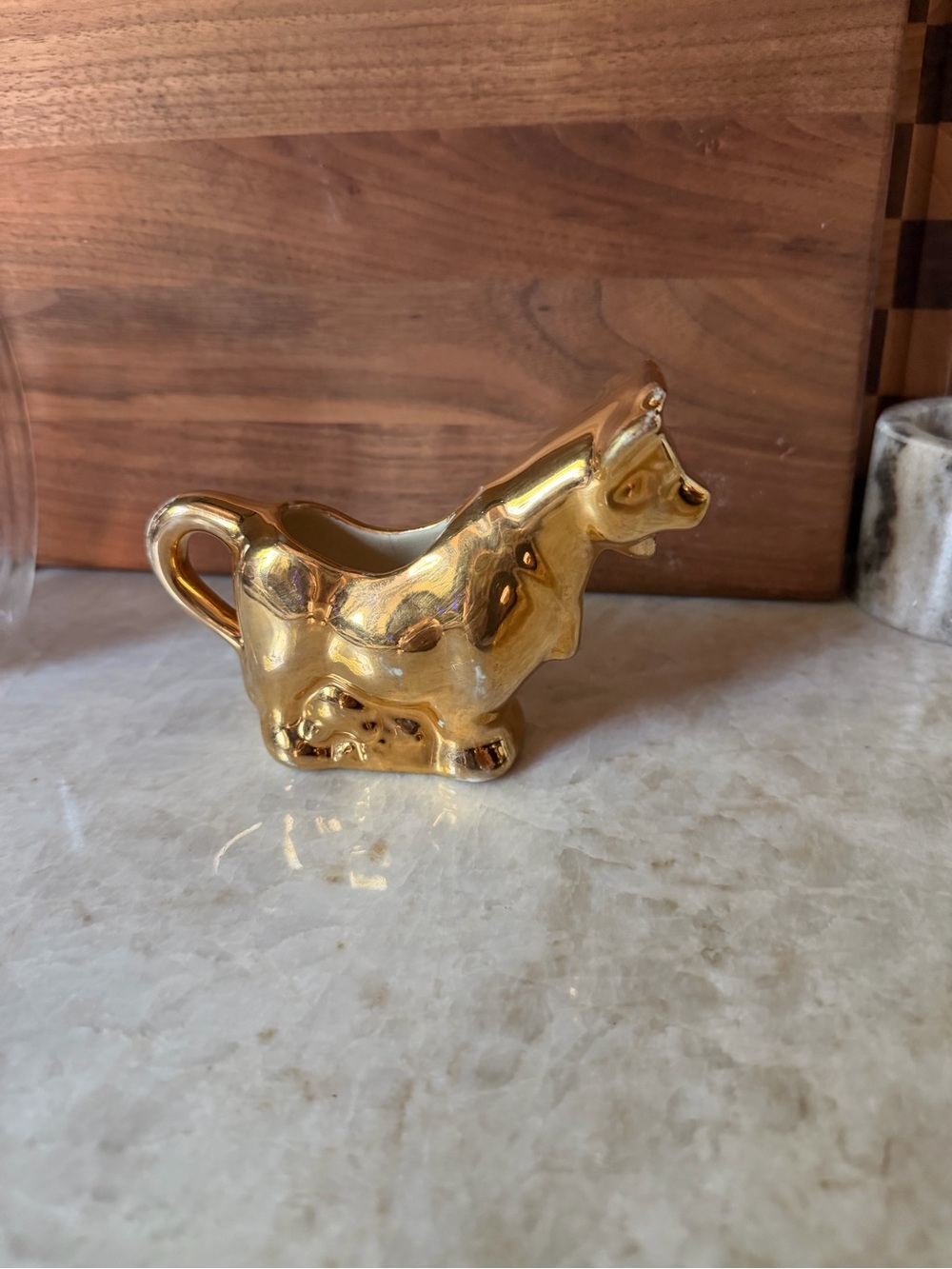 Vintage Warranted 22kt gold plated gold cow creamer
